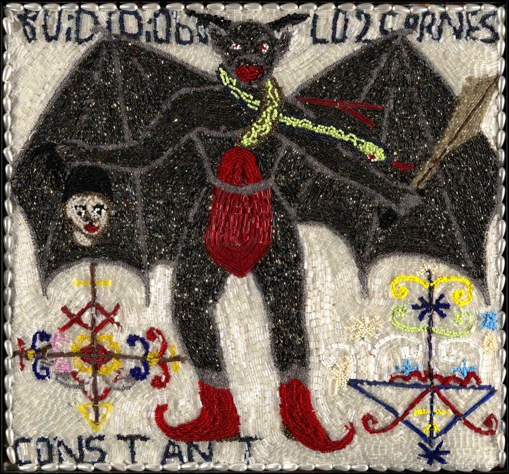 A beaded flag depicting a bat-man hybrid holding a sword and a disembodied head