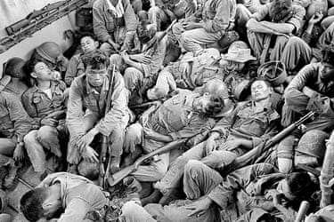 AP Vietnam: Exhausted South Vietnamese soldiers sleep on a US Navy troop carrier AP Vietnam: Exhausted South Vietnamese soldiers sleep on a US Navy troop carrier
