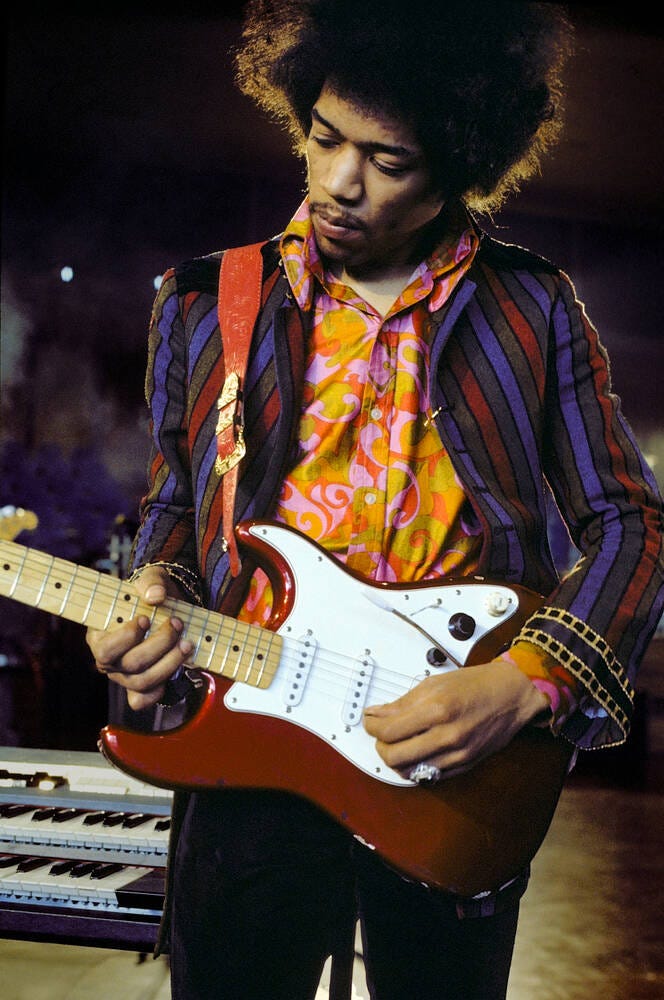 Jimi Hendrix playing the guitar (1967) - Photographic print for sale