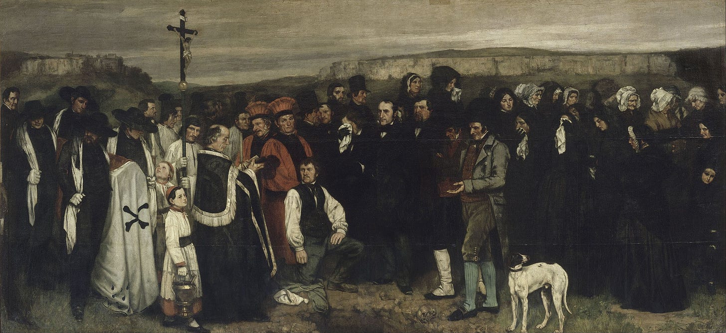Funeral crowd gathered at a graveside