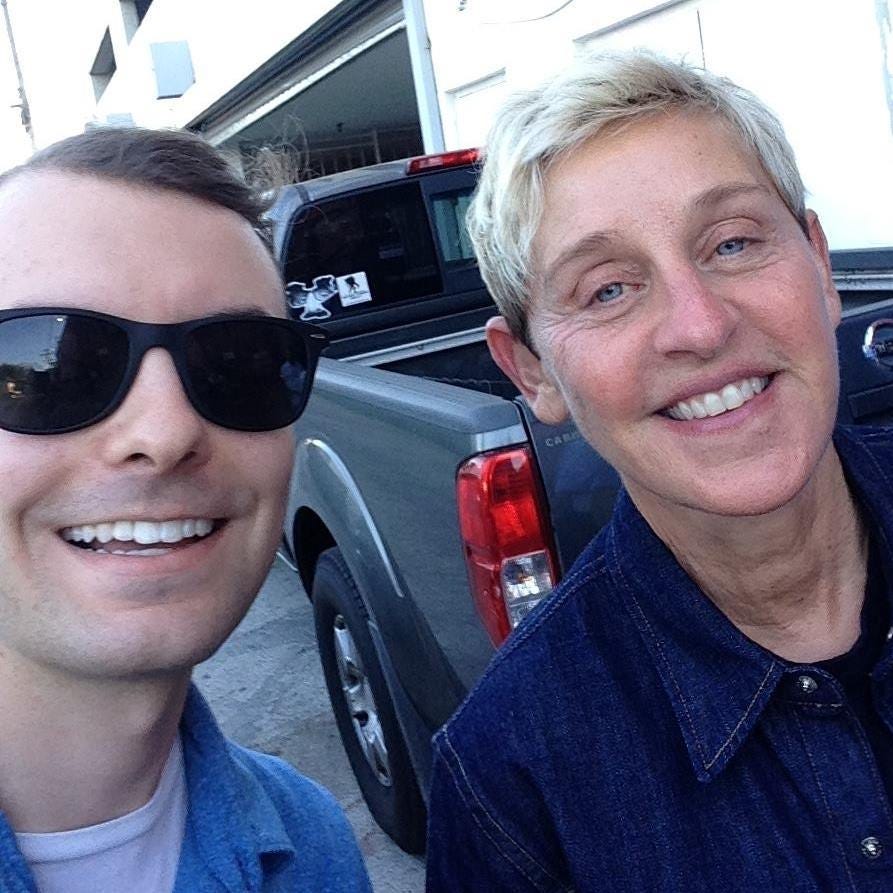 A smiling selfie of the author with Ellen DeGeneres