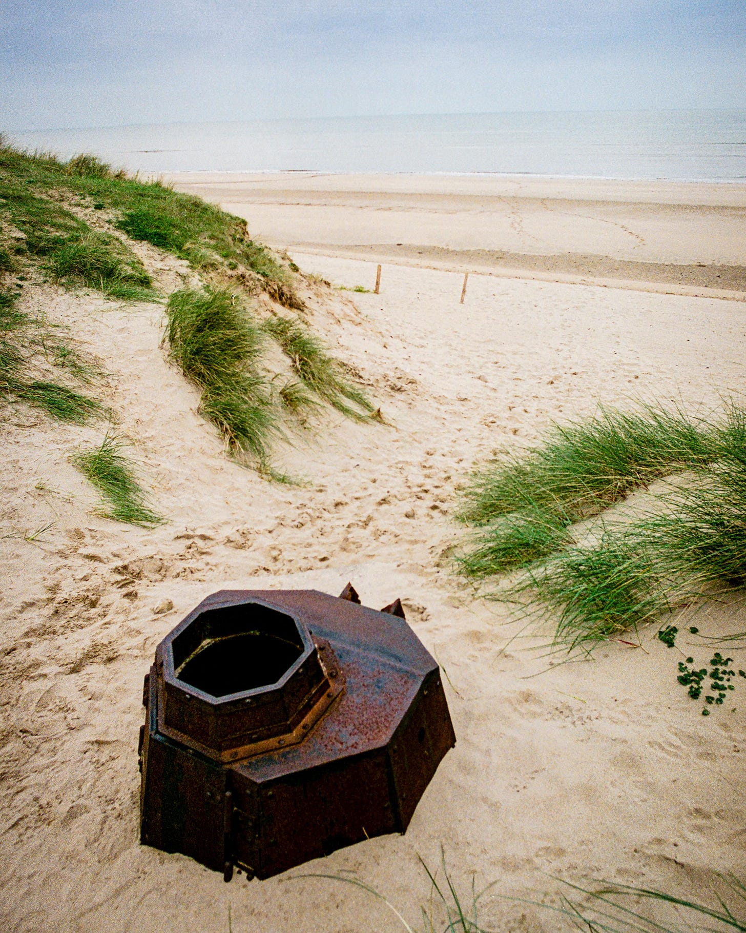 A haunting image of an abandoned German defensive position at Omaha Beach, 1999, a relic of D-Day and WWII.