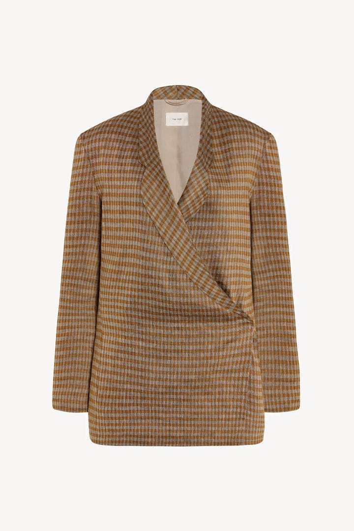 A light brown suit by The Row