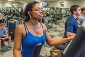 Woman at the gym exercising Woman at the gym exercising