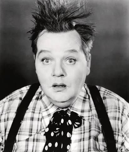 A person with spiky hair wearing suspenders and a plaid shirt
AI-generated content may be incorrect.