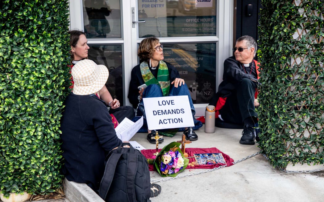 Clergy are protesting the government's lack of recognition for a Palestinian state at MP Erica Stanford's electorate office.