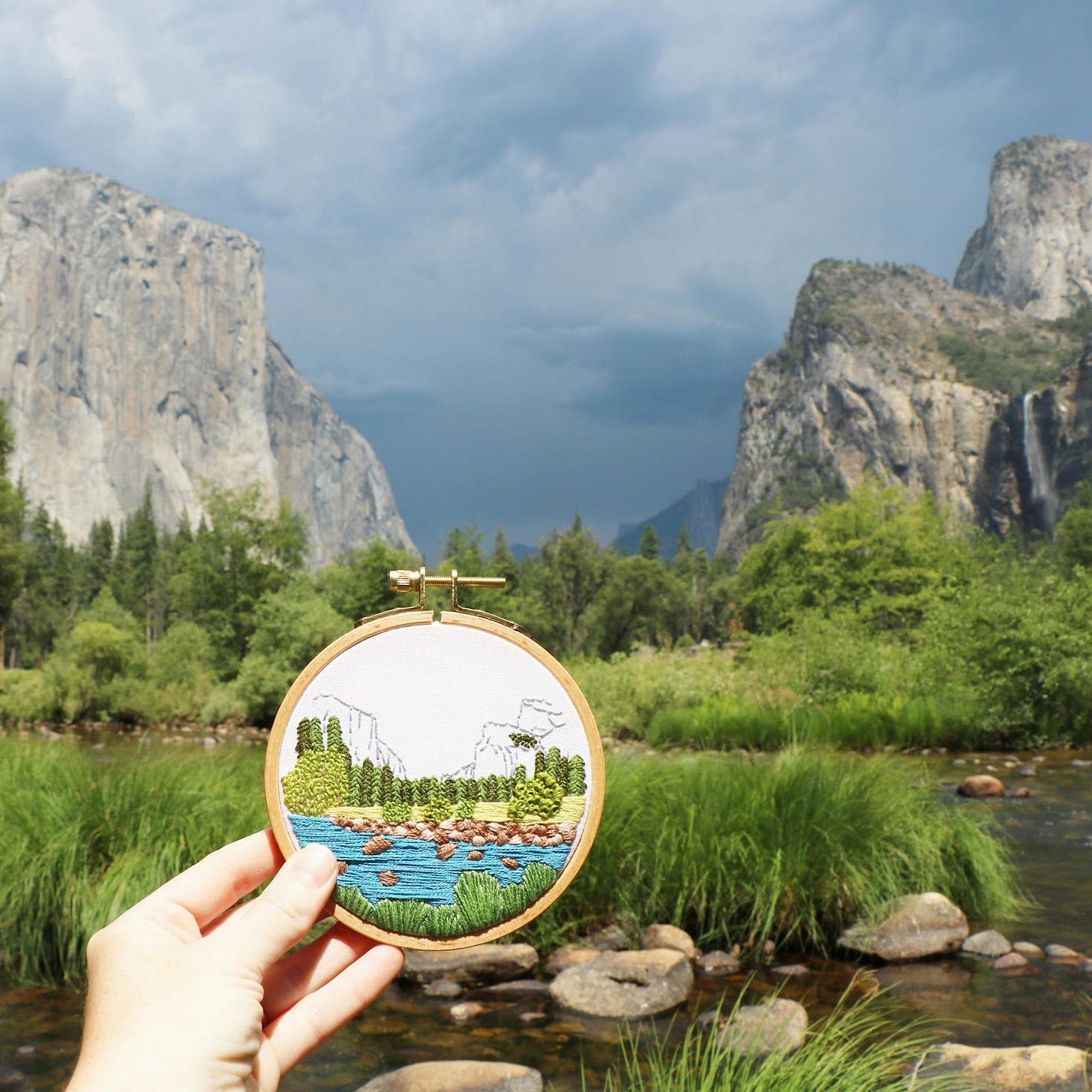 Photo of Yosemite embroidery with the Yosemite landscape in the background