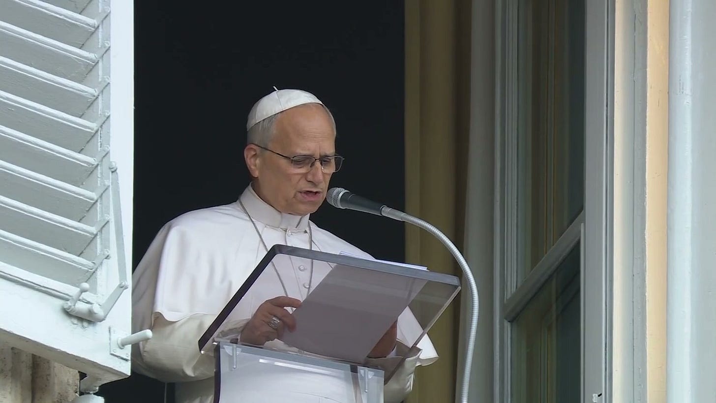 Pope Leo XIV reads from a lectern at the window of the Apostolic Palace Pope Leo XIV reads from a lectern at the window of the Apostolic Palace