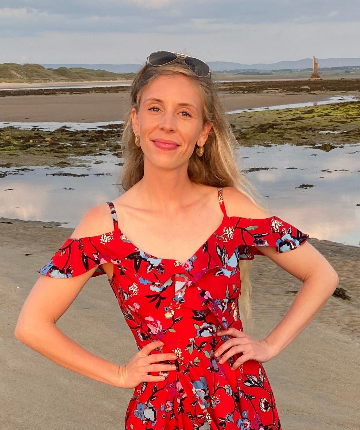 woman in red dress on beach woman in red dress on beach