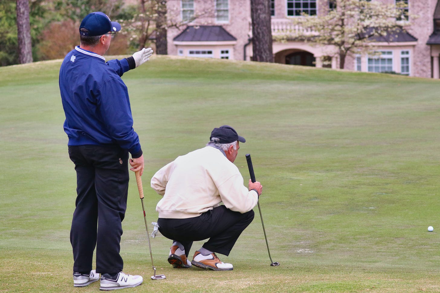 Golfer coaching second golfer Golfer coaching second golfer