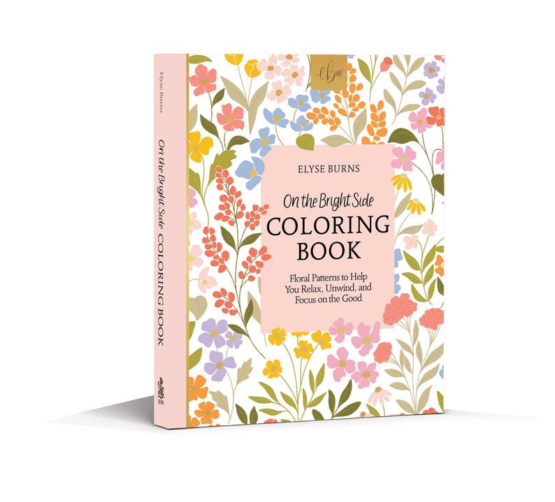May include: A pink and white coloring book with a floral pattern on the cover. The title is "On the Bright Side Coloring Book" by Elyse Burns. The subtitle is "Floral Patterns to Help You Relax, Unwind, and Focus on the Good."