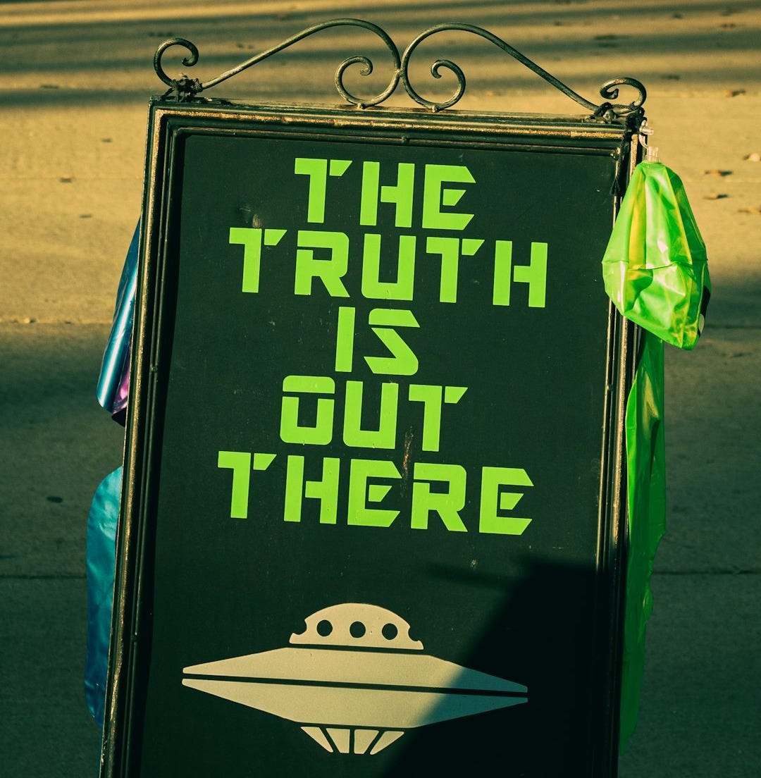 a sign that says the truth is out there