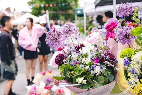 various images of people and flowers at a market in Chiswick, London