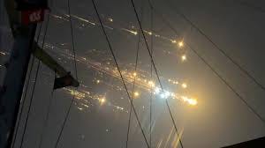 space x debris lights in the night sky