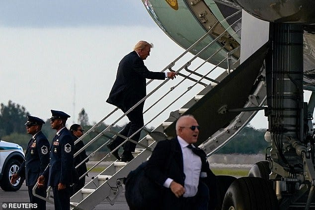 Trump is forced to board Air Force One via small stairs due 'increased  security measures' after suspicious structure was discovered near airport |  Daily Mail Online