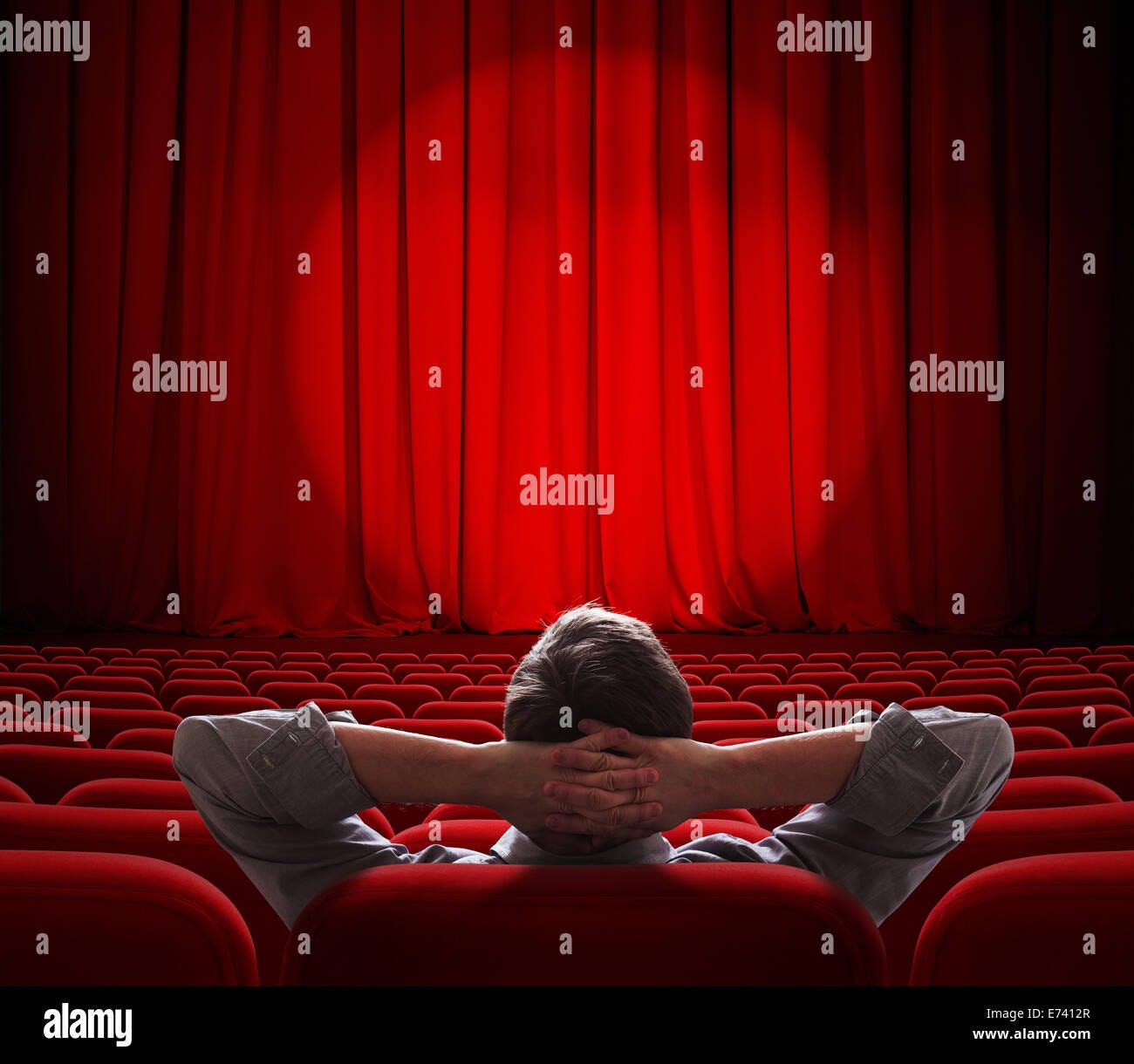Man sitting alone in cinema hi-res stock photography and images - Alamy