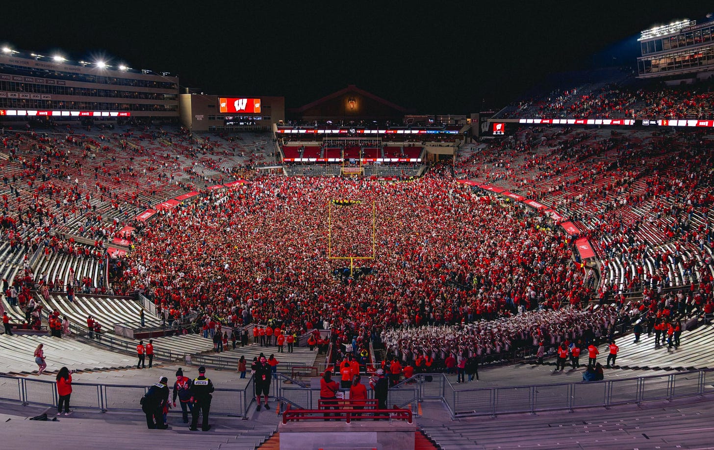 May be an image of hockey and crowd