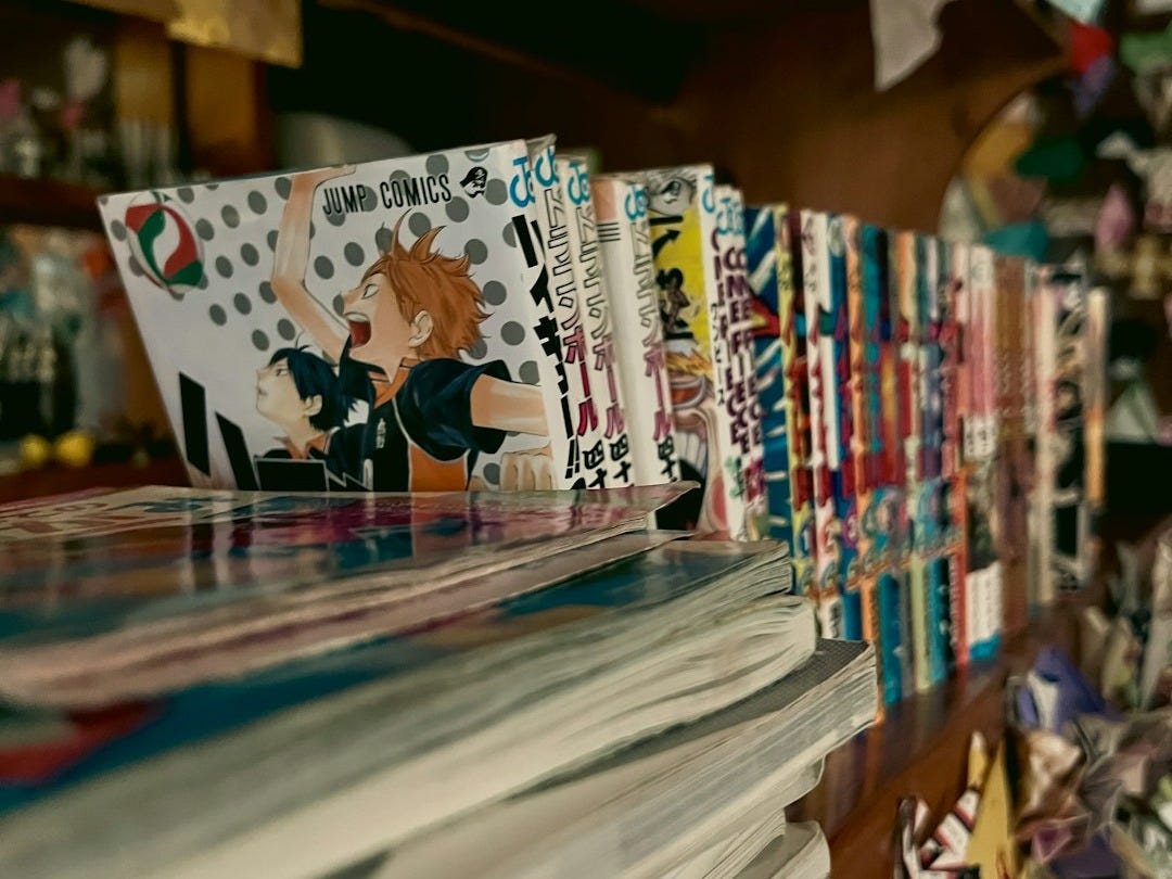 a shelf with a book and a book on it