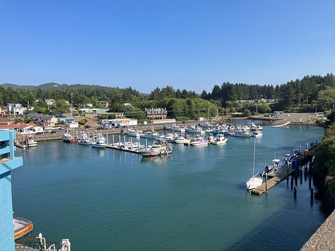 Depoe Bay harbor, coast, and whale sculpture