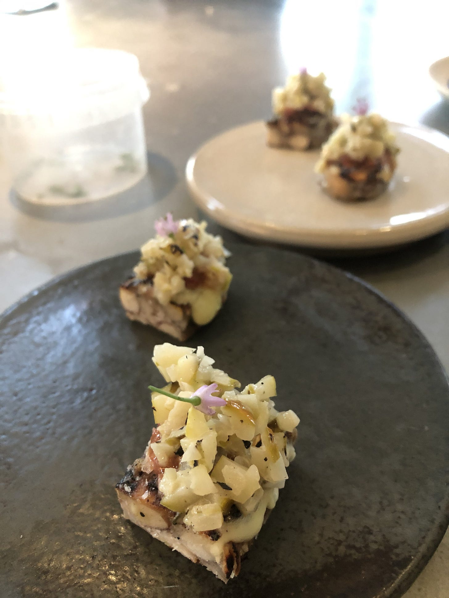 Charred tempeh glazed in Smokey Kosho and honey with a grilled cucumber relish