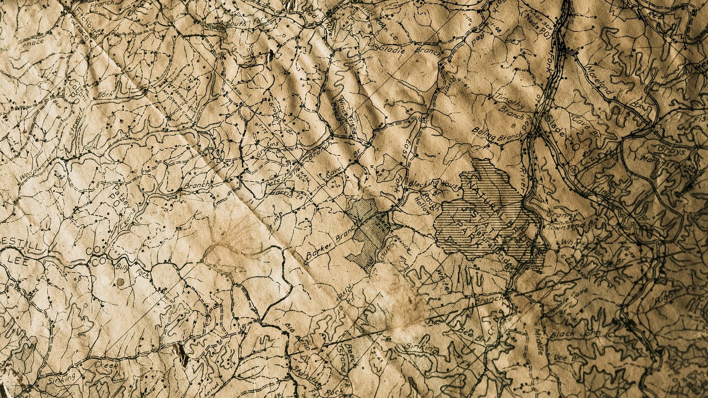 An old, yellowed map showing a mountainous region.
