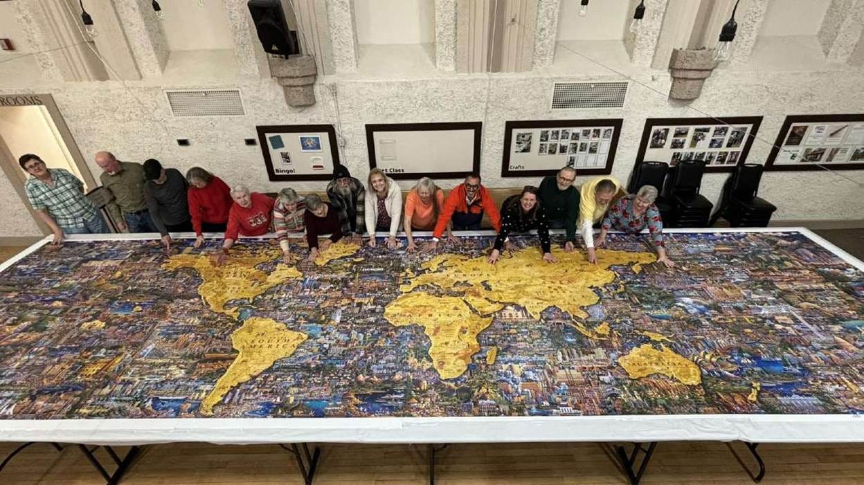 Puzzle maker visits Springville seniors who completed his 60,000-piece  puzzle | KSL.com
