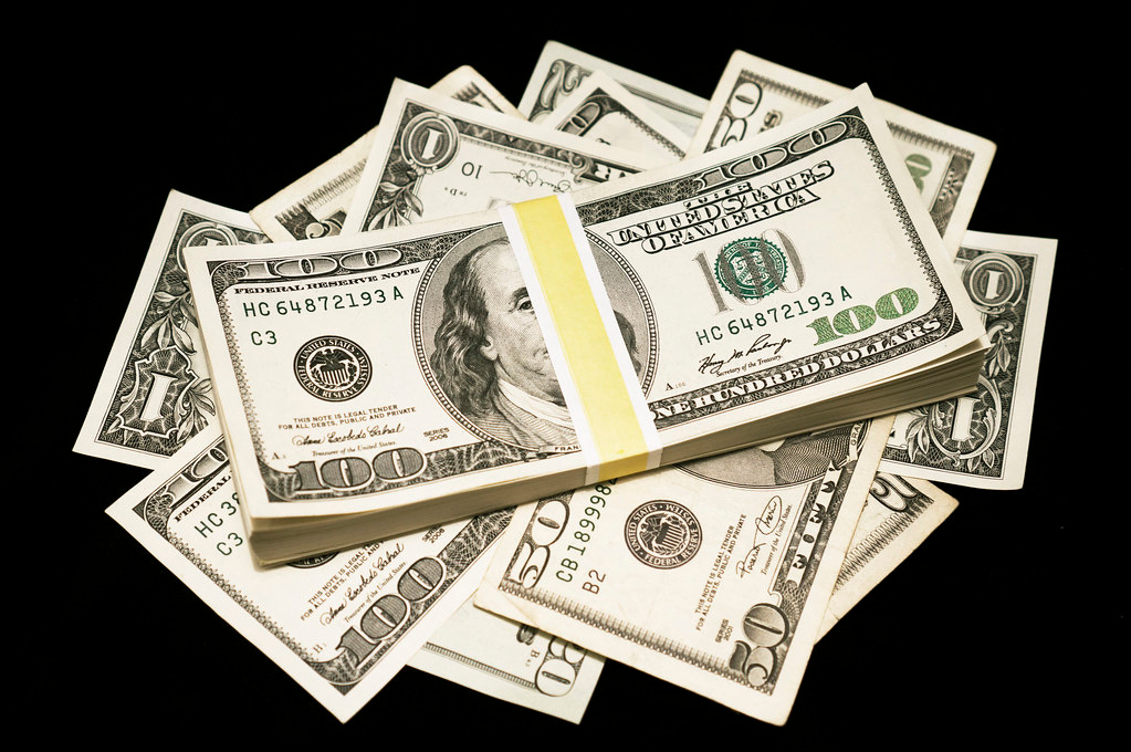 Pile of Bills on Black