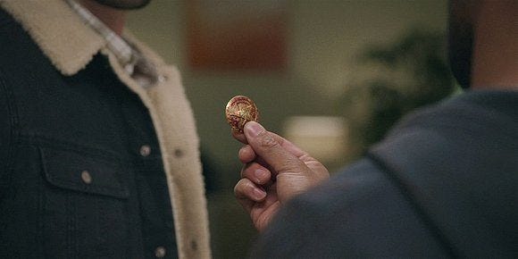 Trey gives Cordell Walker button from James uniform. Trey gives Cordell Walker button from James uniform.