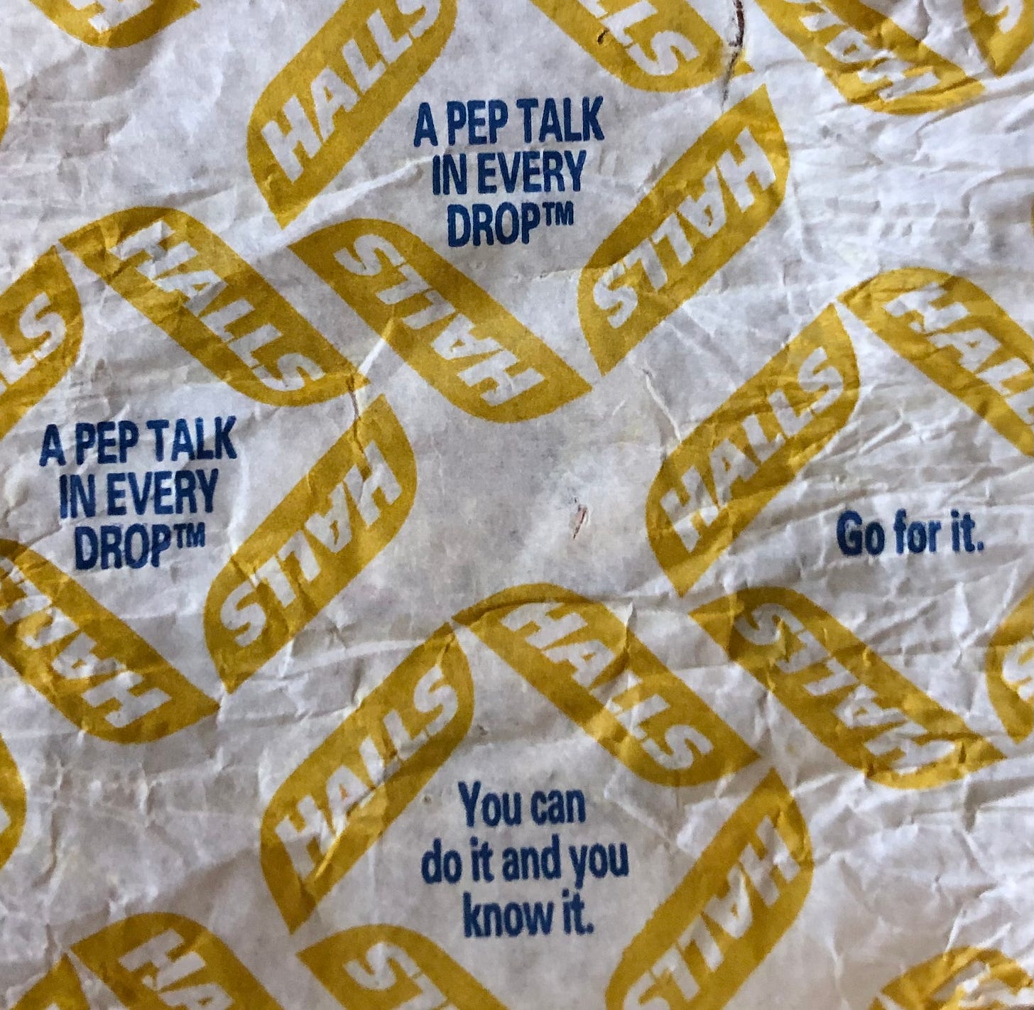 A cough drop wrapper that says, “a pepe talk in every drop” and “Go for it.”