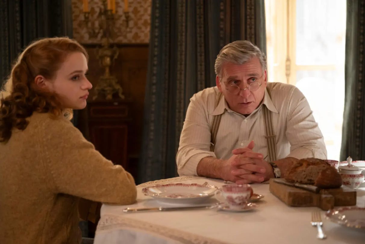 Joey King and Lior Ashkenazi in We Were the Lucky Ones