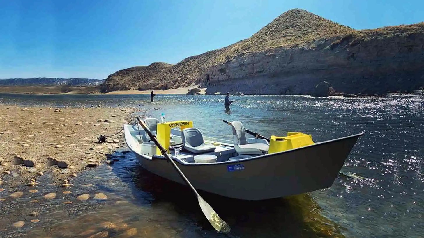 Drift Boat in the Bend of the River with Anglers Wade Fishing