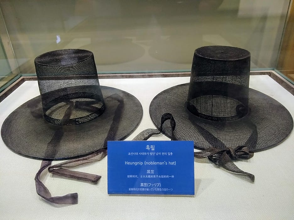 A pair of black hats
AI-generated content may be incorrect. A pair of black hats
AI-generated content may be incorrect.