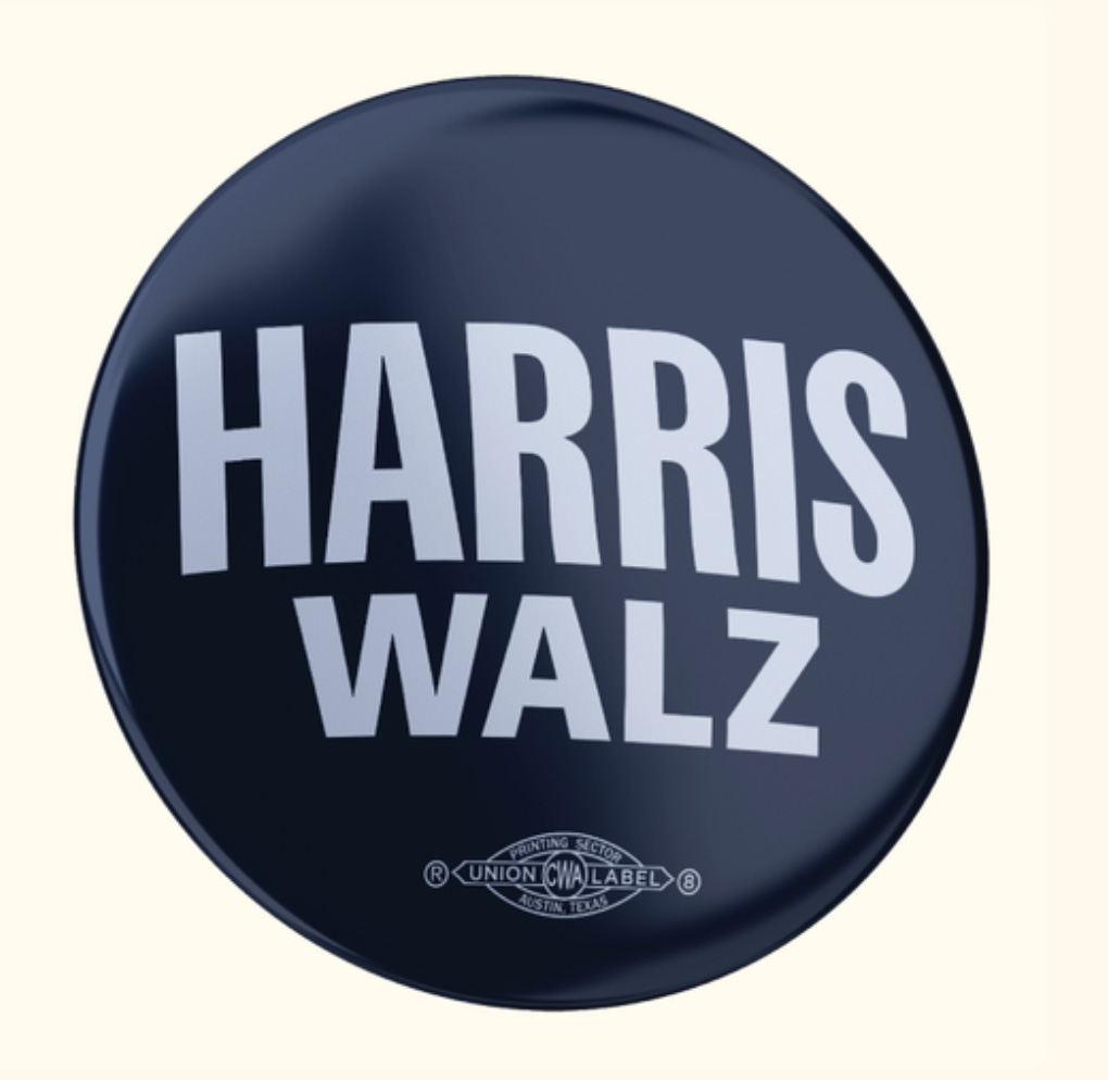 Blue campaign button with white letters that say HARRIS WALZ