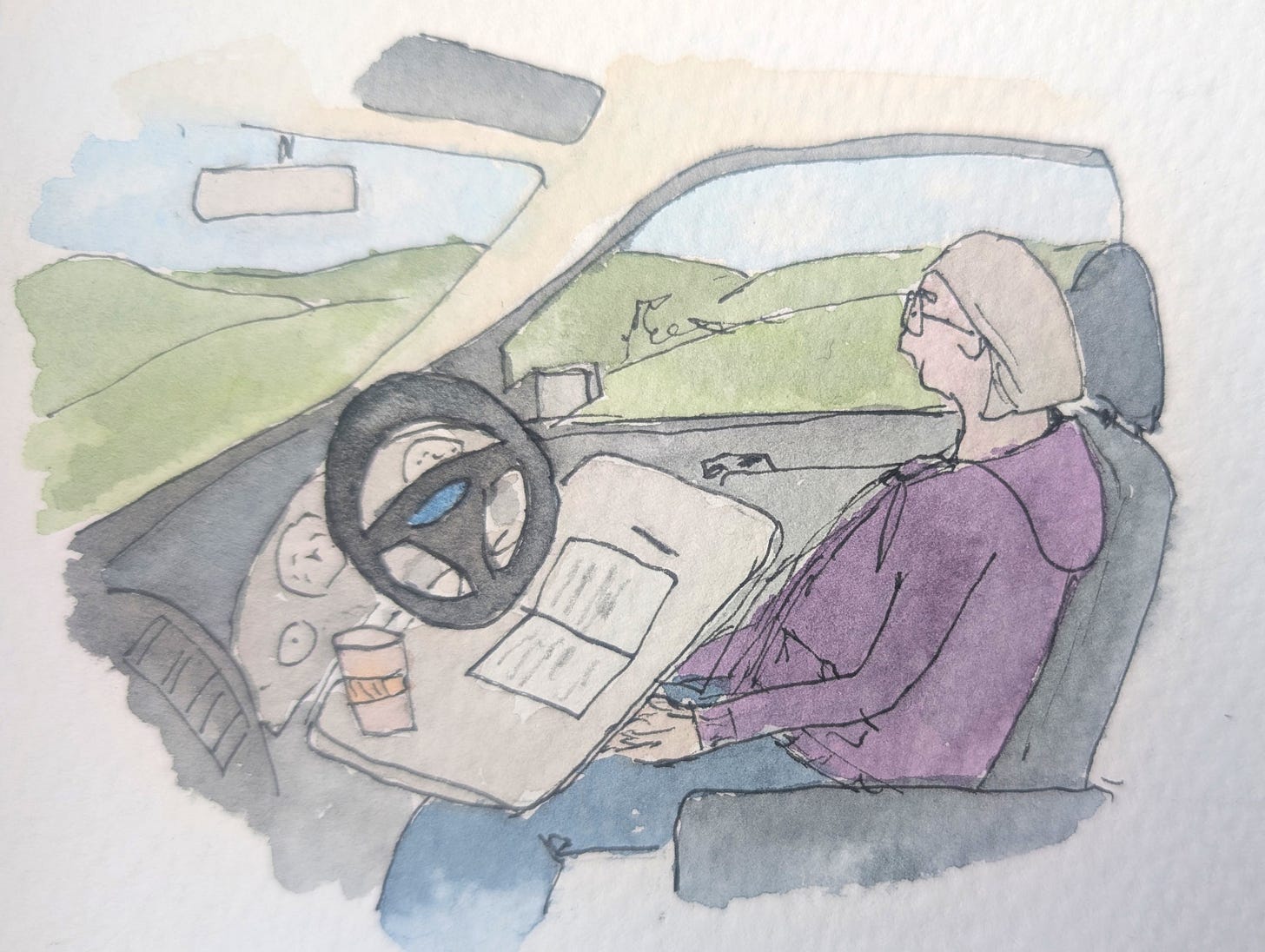 Loose ink-and-watercolour illustration of a woman sitting quietly in the driver’s seat of a parked car overlooking green countryside. A steering wheel tray holds a takeaway coffee and an open notebook, while the woman relaxes back in her seat with her phone resting in her lap. Painted in soft muted tones with a calm, reflective atmosphere.