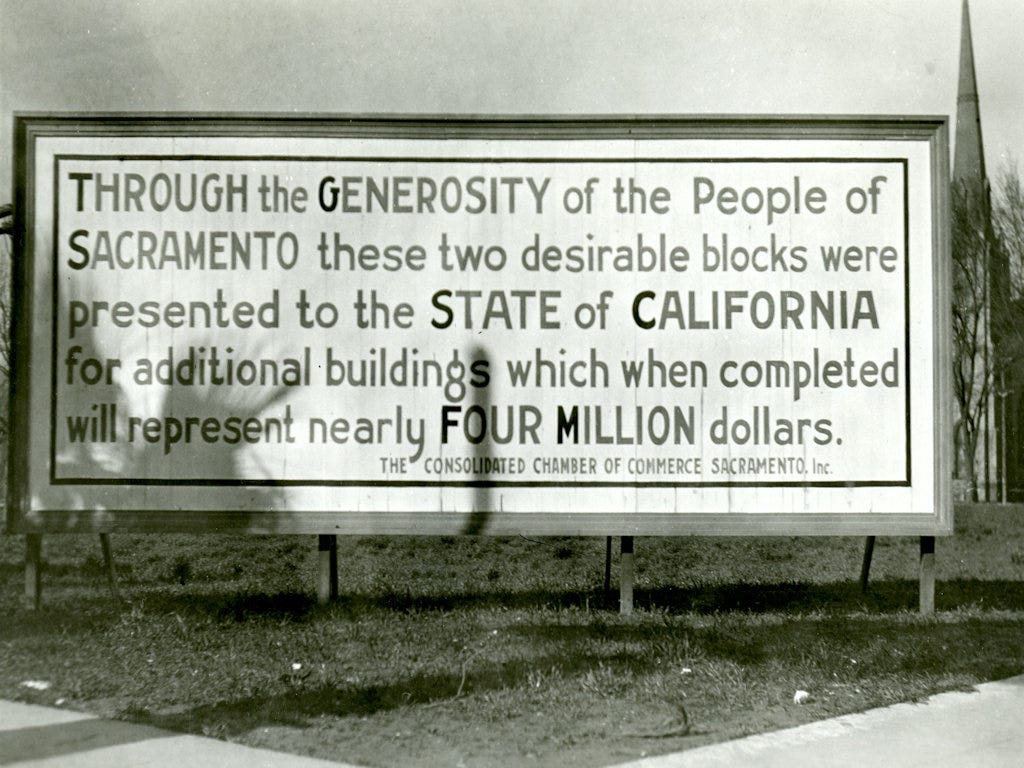 A billboard reminding readers that a land for state buildings was donated by Sacramento. It's an older photo. A billboard reminding readers that a land for state buildings was donated by Sacramento. It's an older photo.