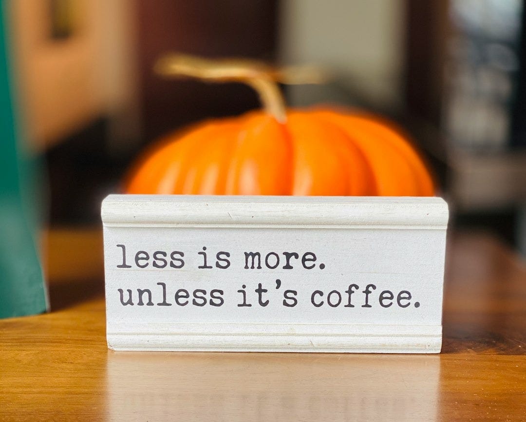 white and black i love you card on brown wooden table