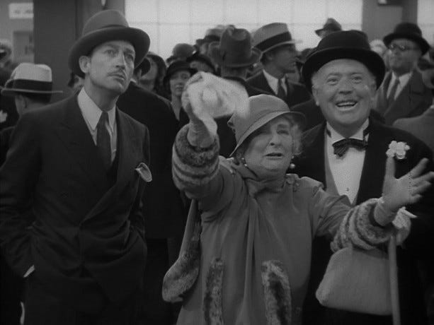 Warren William, May Robson, and Guy Kibbee in a scene from Lady for a Day