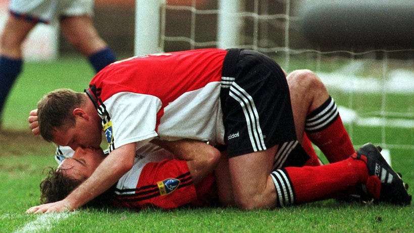Ally McCoist and Paul Gascoigne kissing after a goal. Picture: Rob Casey Ally McCoist and Paul Gascoigne kissing after a goal. Picture: Rob Casey