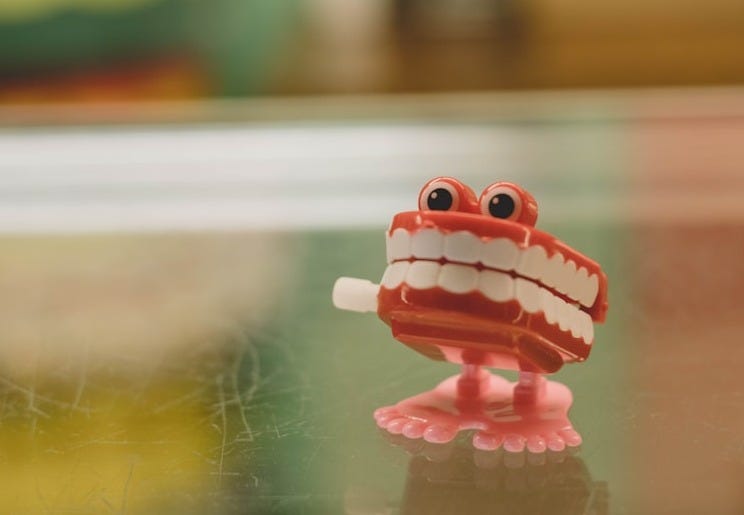 a red toy on a table