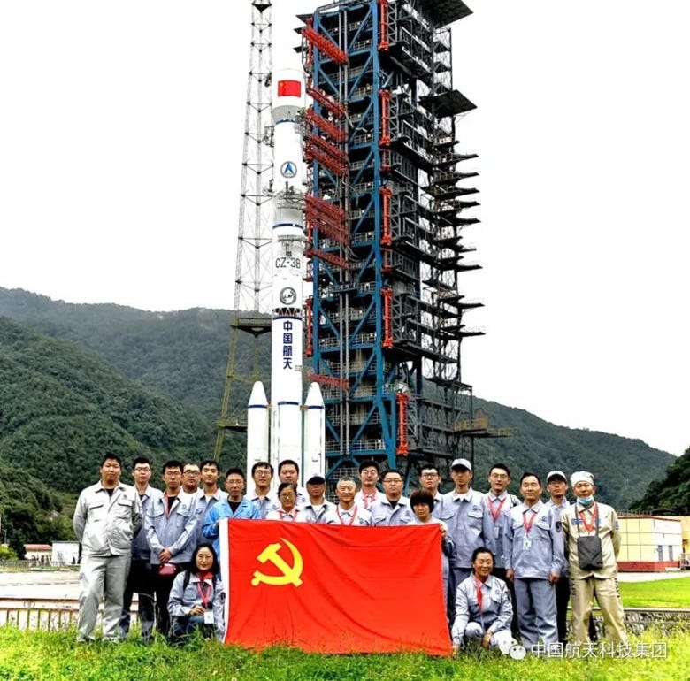 The team that worked on the Shijian-21 spacecraft at the launch site ahead of its launch.