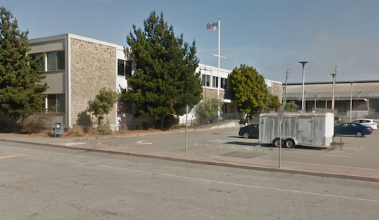 A gray two-story office building in mid-Century style. It was the San Francisco production office for the Steve Jobs movie.