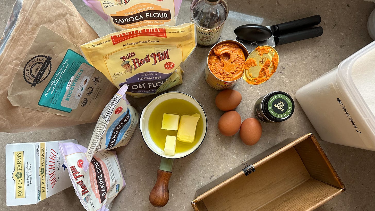 Ingredients for pumpkin bread displayed.