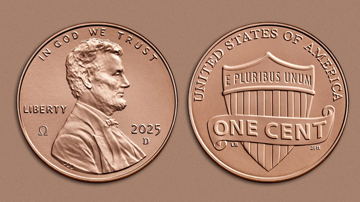 Close-up of a 2025 copper-colored US one cent coin featuring Abraham Lincoln's profile on the front with 