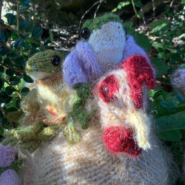 Soft toys hiding in the bushes