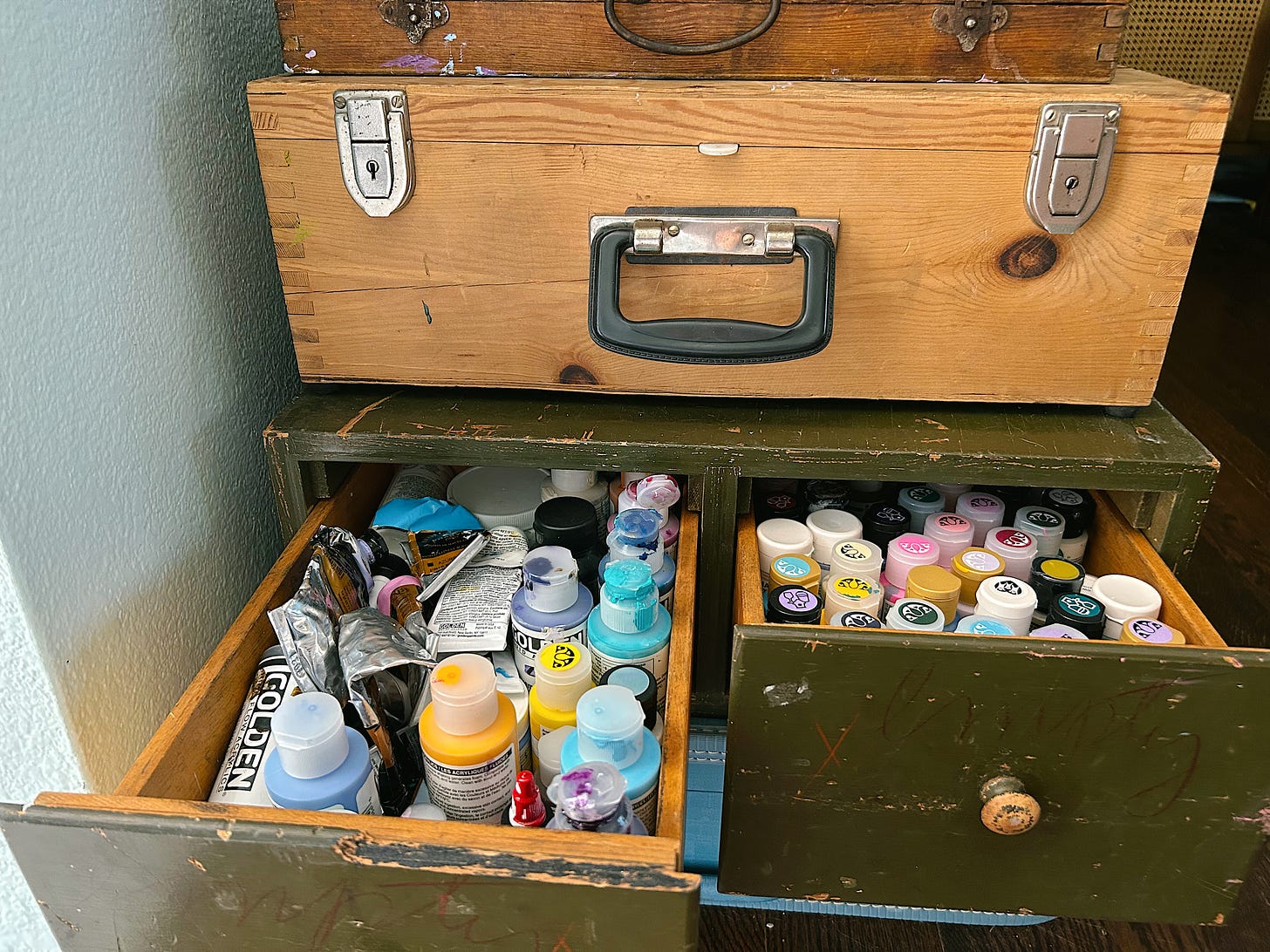 Vintage green drawers holding paint Vintage green drawers holding paint
