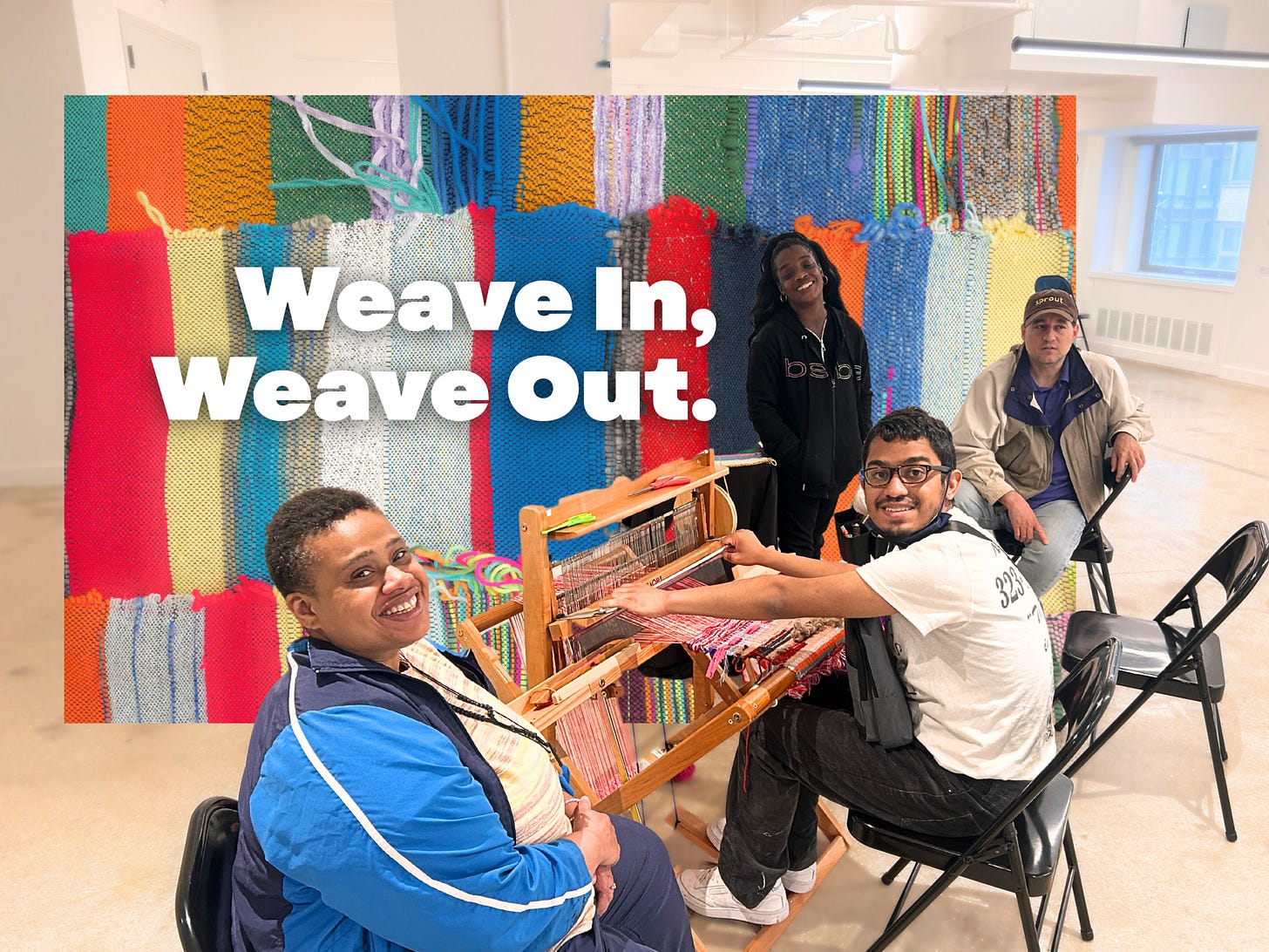 A group of 4 mostly BIPOC artists smile for the camera around a loom.