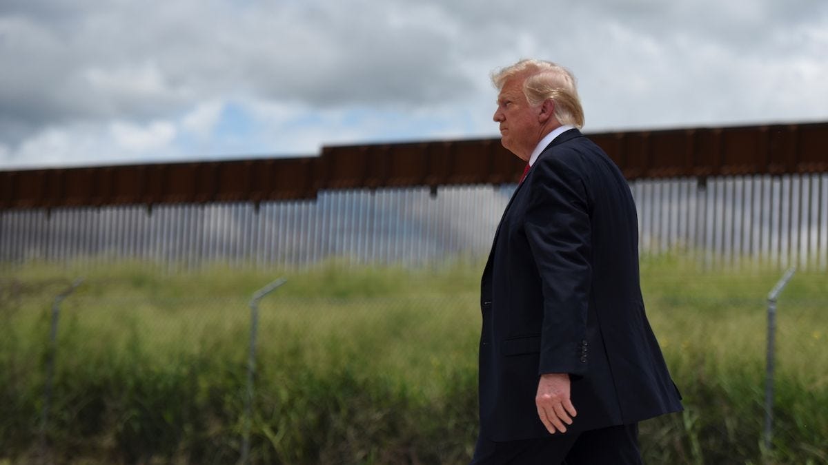 Donald Trump at the Mexican border wall during his first term - Callaghan O'Hare/Reuters