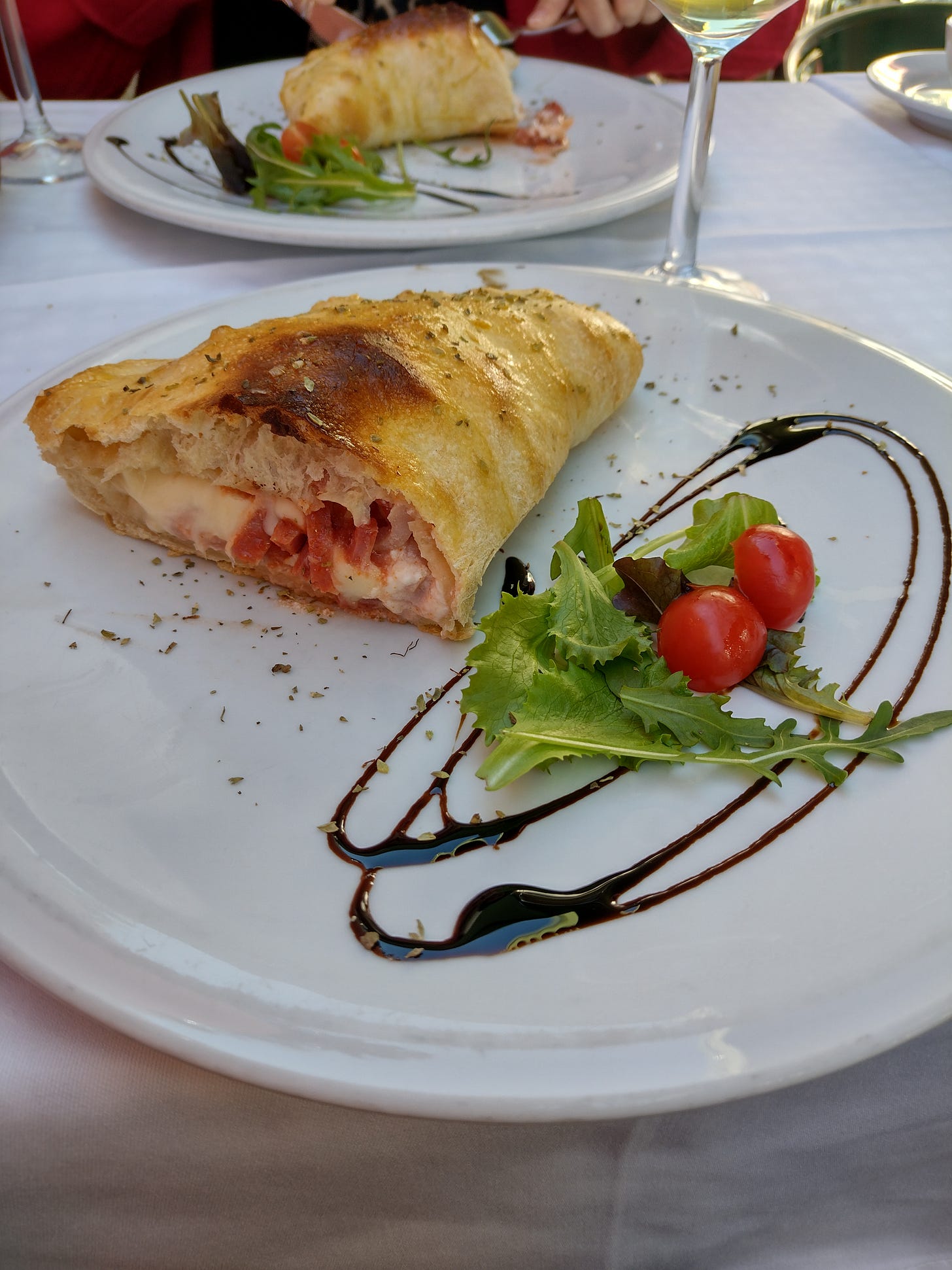Image of a calzone on a plate. Image of a calzone on a plate.