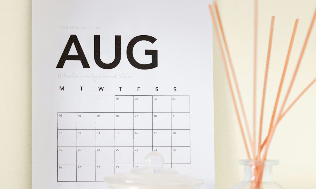 Aug calendar on wall Aug calendar on wall