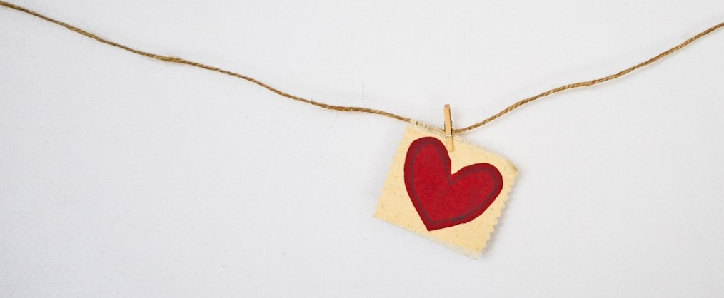 heart-shaped red and beige pendant